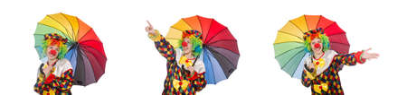 Clown with umbrella isolated on whiteの写真素材
