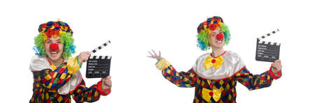 Clown with movie clapper isolated on whiteの写真素材