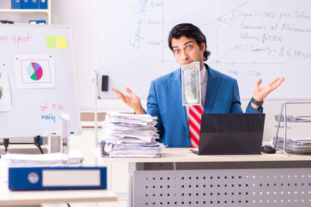 Male sales analyst in front of the whiteboardの写真素材
