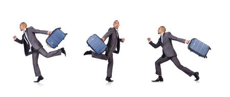 Businessman with luggage on whiteの写真素材