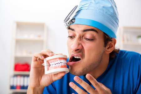 Mad doctor working in the clinic