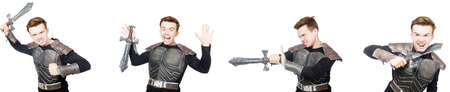 Young funny man in armour suitの写真素材