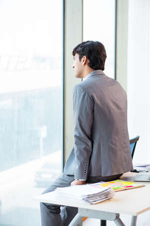 Young successful businessman working at the officeの写真素材
