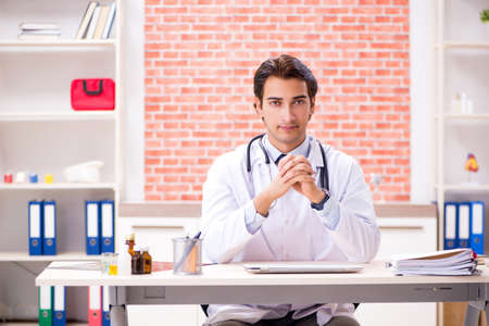 Young doctor working in hospitalの写真素材