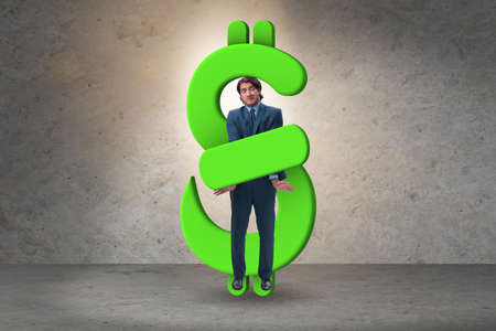 Businessman in dollar and debt conceptの写真素材