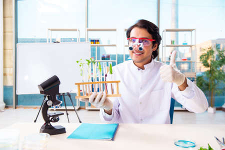 Male biotechnology scientist chemist working in the labの写真素材