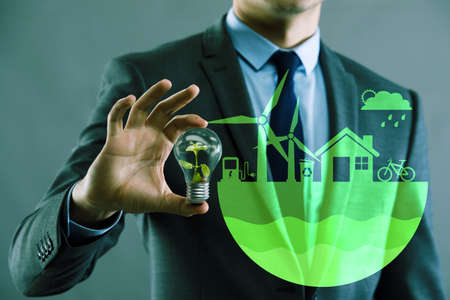 Businessman in ecological green conceptの写真素材