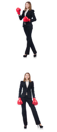Businesswoman with boxing gloves isolated on whiteの写真素材