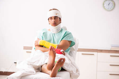 Young injured man staying in the hospital