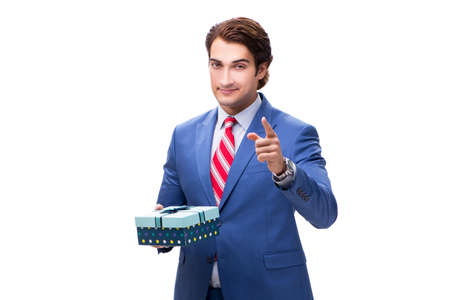 Elegant businessman with giftbox isolated on white backgroundの写真素材