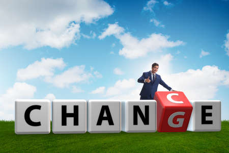 Businessman taking chance for changeの写真素材