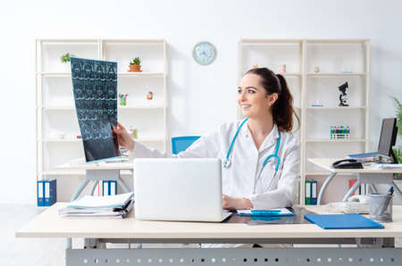 Young female doctor radiologist working in the clinic