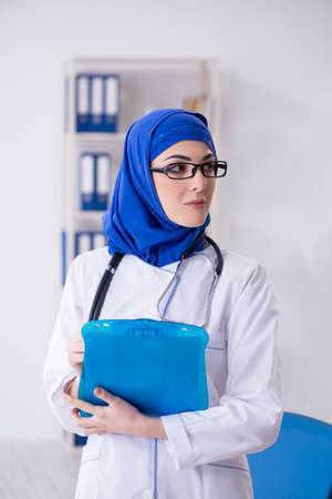 Arab female doctor working in the clinicの写真素材