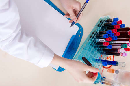 Young female chemist working in the lab
