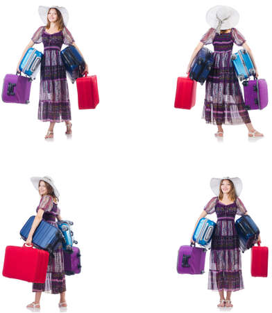 Young woman with suitcases isolated on whiteの写真素材