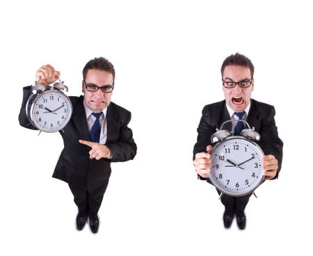 Businessman with alarm-clock in time management conceptの写真素材