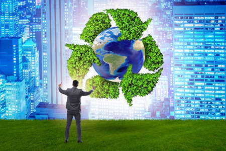 Businessman in recycling ecological conceptの写真素材