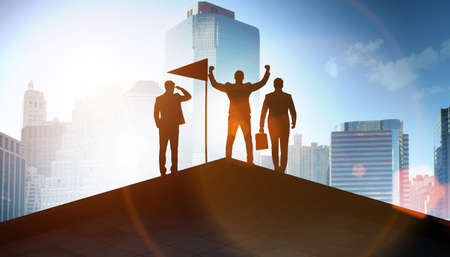Businessmen in achievement and teamwork concept