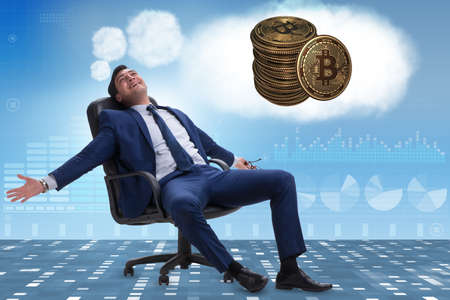 Young businessman dreaming of better thingsの写真素材