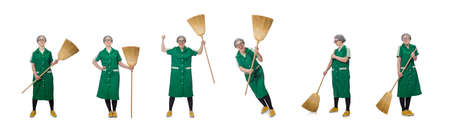 Woman with sweeping brush isolated on whiteの写真素材