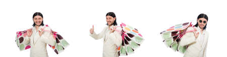 Man with shopping bags isolated on whiteの写真素材