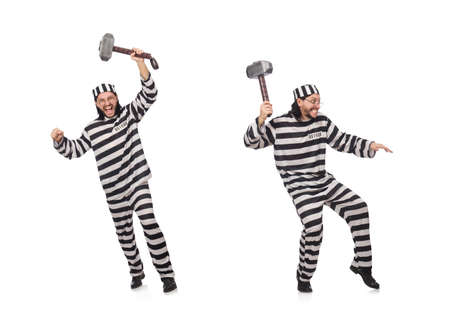 Prison inmate with hammer isolated on whiteの写真素材