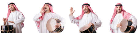 Arab man with drum isolated on white backgroundの写真素材