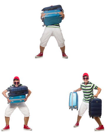 Young man with heavy suitcases isolated on white backgroundの写真素材