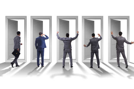 Businessman in uncertainty concept with many doors