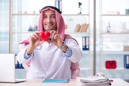 Arab doctor cardiologist working in the clinicの写真素材