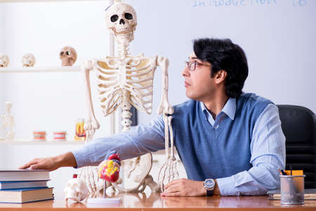 Young lecturer teacher teaching anatomy