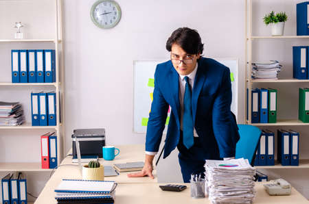 Young businessman working in the officeの写真素材