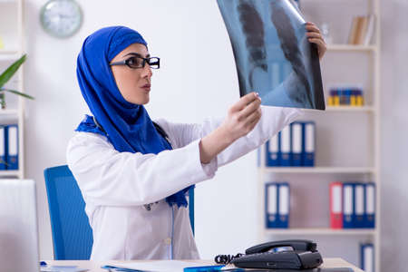 Arab female doctor working in the clinicの写真素材