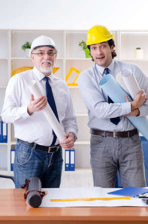 Two engineers colleagues working under projectの写真素材