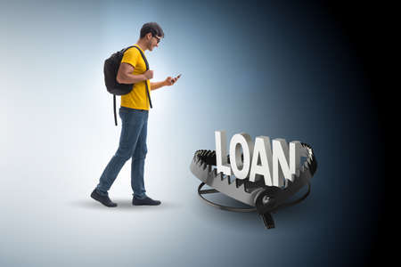 Young student in loan and debt conceptの写真素材
