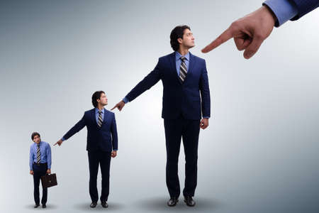 Businessmen blaming each other for failuresの写真素材