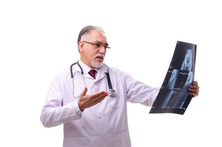 Old male doctor isolated on white