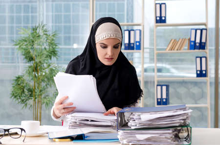 Woman muslim employee working in the officeの写真素材