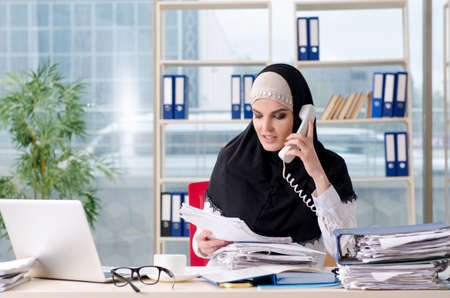 Woman muslim employee working in the officeの写真素材