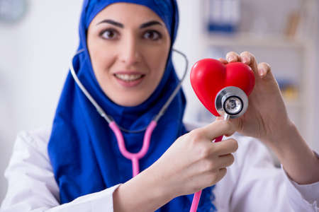 Arab female doctor working in the clinicの写真素材