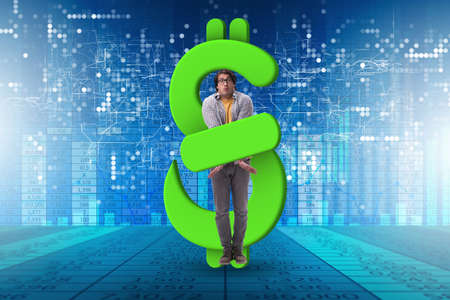 Young man in student loan and debt conceptの写真素材