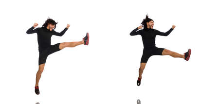 Young man doing sports isolated on the white backgroundの写真素材