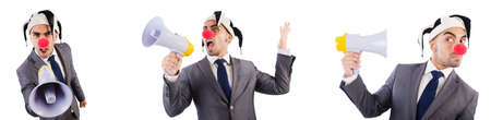 Funny clown businessman with megaphoneの写真素材