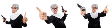Man in nun dress with handgunの写真素材