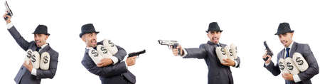 Young gangster in suit with handguns
