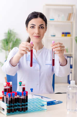 Young female chemist working in the labの写真素材