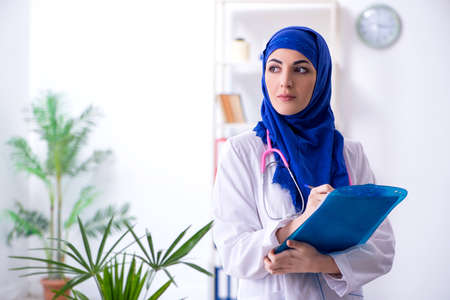 Arab female doctor working in the clinicの写真素材