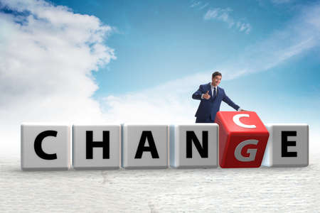 Businessman taking chance for changeの写真素材