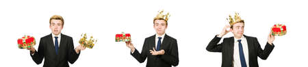 Businessman with crown isolated on whiteの写真素材