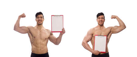 Muscular man with blank pad for your messageの写真素材